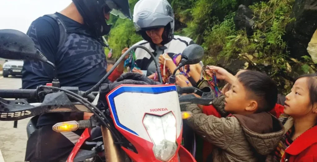 Making new friends - 13 day vietnam motorcycle tour